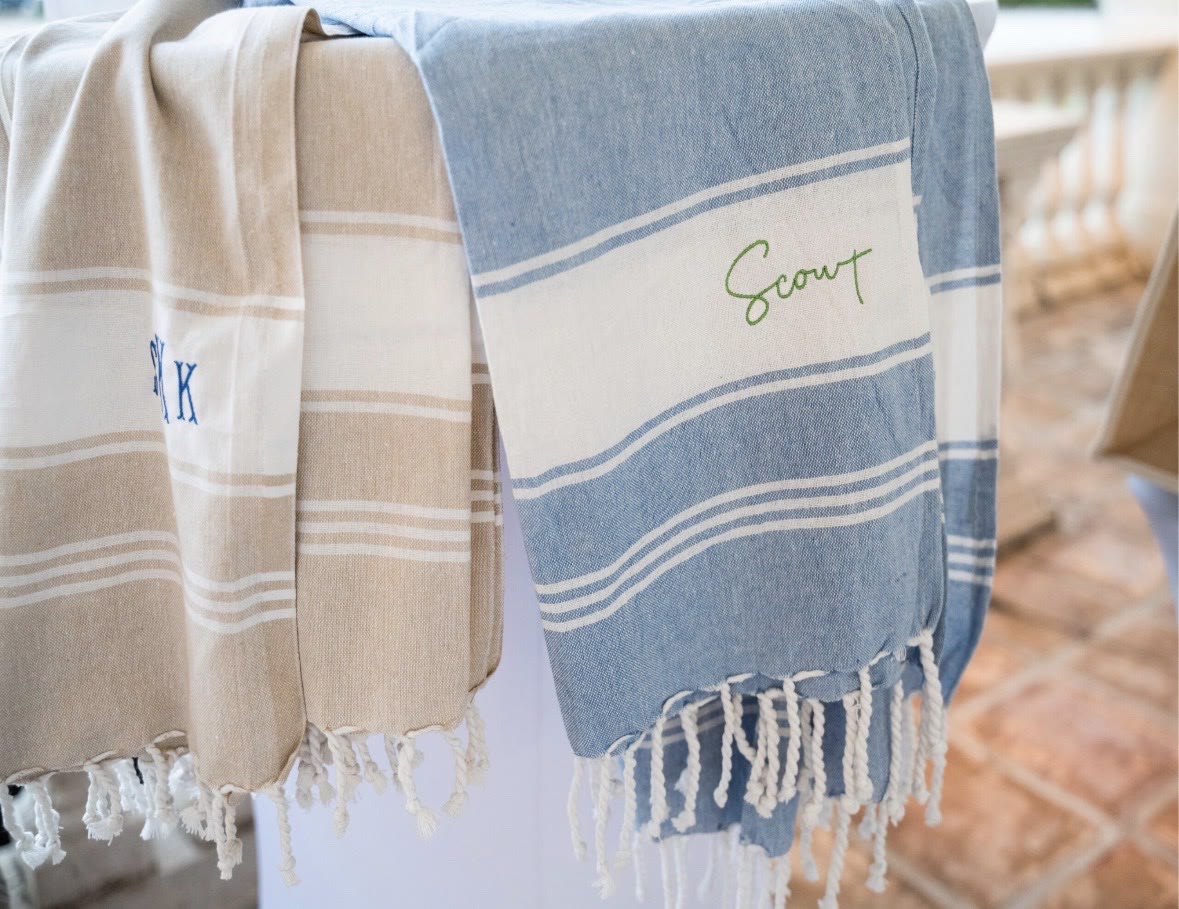 Beach towels personalised in real time.